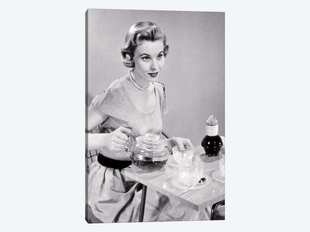 1950s Hostess Woman Housewife Serving Pouring Tea Coffee Seated At Table by Vintage Images 1-piece Canvas Print