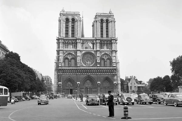 Notre Dame Cathedral: 1950s Notre Dame Cathedral Single Anonymous Silhouetted Pedestrian Man Ile De La Cite Paris France by Vintage Images