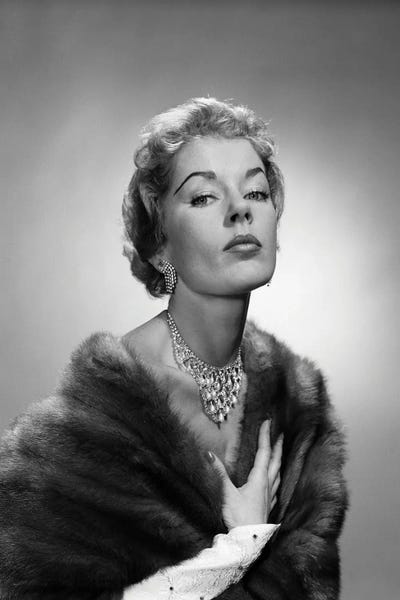 Women's Coats & Jackets: 1950s Portrait Of Glamorous Woman Wearing Fur Stole Elegant Necklace Earrings by Vintage Images