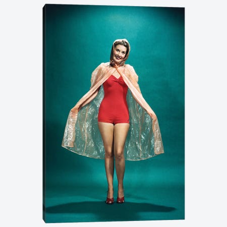 1950s Smiling Woman Pinup Wearing Red One Piece Bathing Suit Rain Cape Looking At Camera Canvas Print #VTG804} by Vintage Images Art Print