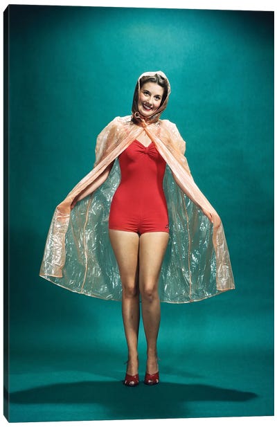 1950s Smiling Woman Pinup Wearing Red One Piece Bathing Suit Rain Cape Looking At Camera Canvas Art Print - Vintage Images