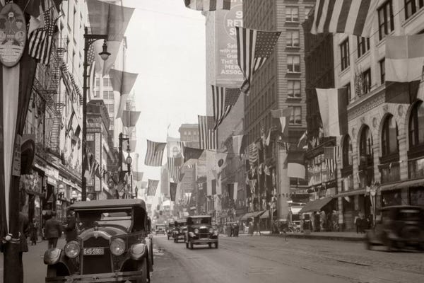 Streets: 1926 Downtown Chicago State Street With American And Other National Flags by Vintage Images