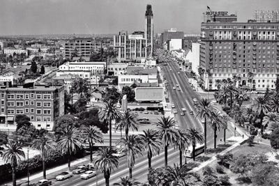 1960s Aerial Of Wilshire Boulevard Look Across Lafayette Park To Shopping District Sheraton Hotel Palm Trees Los Angeles Ca USA by Vintage Images art print