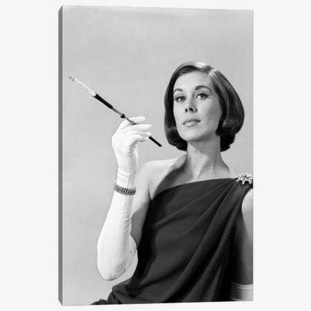 1960s Formally Elegantly Dressed Young Woman Arrogant Expression Holding Long Cigarette Holder Wearing Long White Gloves Canvas Print #VTG817} by Vintage Images Canvas Wall Art
