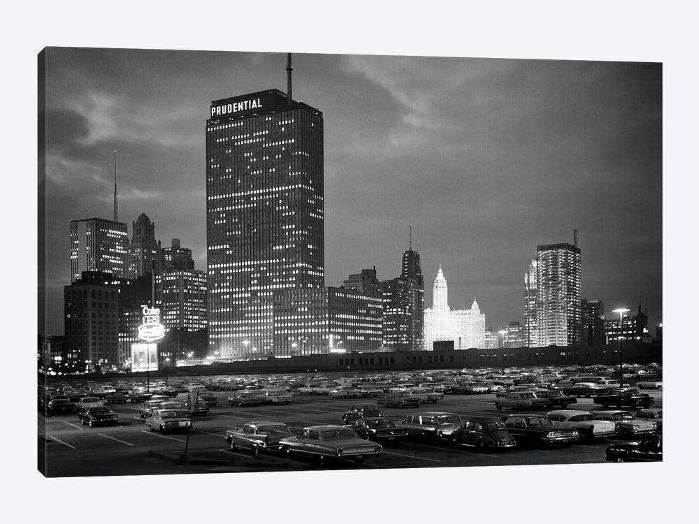 1960s Night Skyline Of Prudential Building And Brightly Lit Wrigley Building From Monroe Drive Chicago Illinois USA by Vintage Images 1-piece Canvas Print