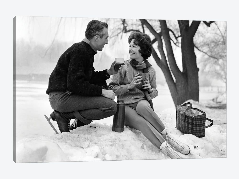 1960s Smiling Couple In Snow Wearing Ice Skates Drinking Hot Beverage From Thermos by Vintage Images 1-piece Art Print