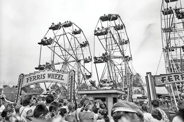 1960s Teens Lined Up At Ticket Both To Ride On One Of Three Ferris Wheels At County Fair