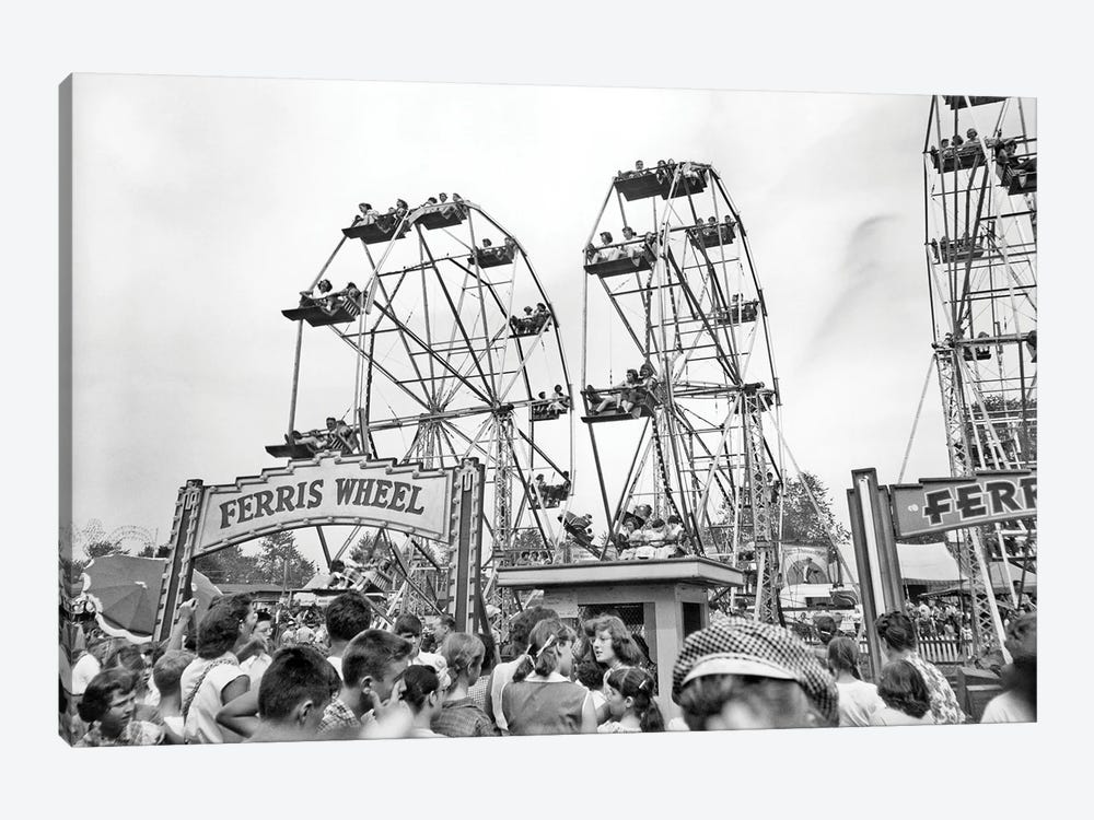 1960s Teens Lined Up At Ticket Both To Ride On One Of Three Ferris Wheels At County Fair by Vintage Images 1-piece Canvas Art Print