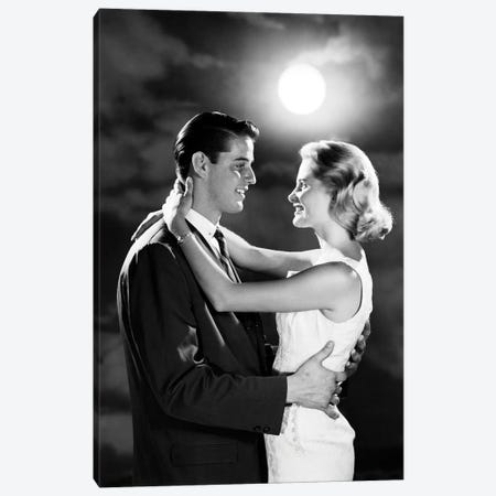 1960s Young Couple Embracing In Moonlight Canvas Print #VTG825} by Vintage Images Canvas Print