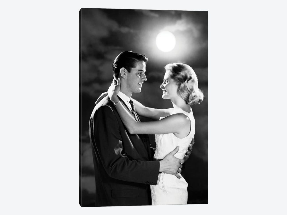 1960s Young Couple Embracing In Moonlight by Vintage Images 1-piece Canvas Wall Art