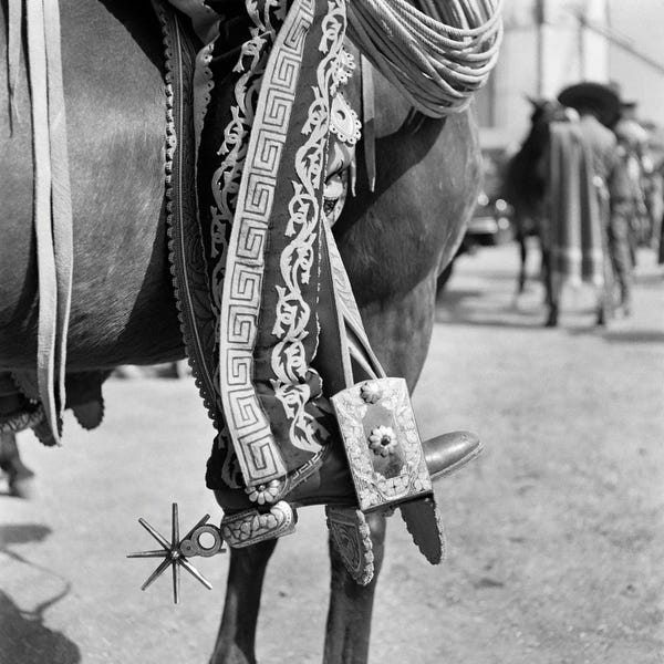 Boots: 1930s Detail Of Traditional Charro Cowboy Costume Embroidered Chaps Spurs Leather Boots In Horses Stirrup Mexico by Vintage Images