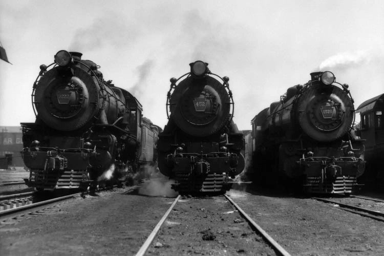 1930s Head-On Shot Of Three Steam Engine Train Locomotives On Tracks