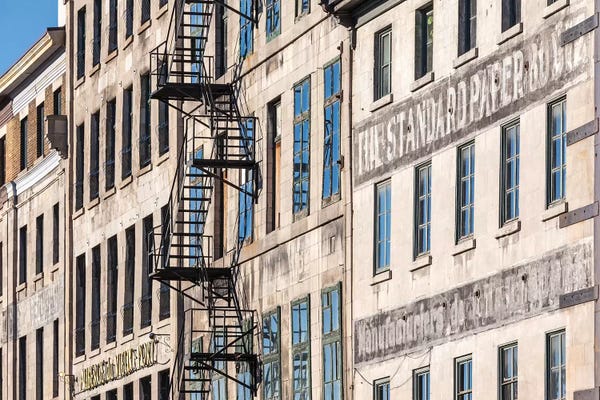 Walter Bibikow: Canada, Quebec, Montreal. The Old Port, buildings along Rue de la Commune by Walter Bibikow