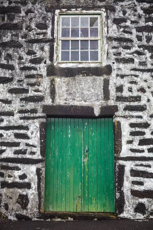 Portugal, Azores, Pico Island, Porto Cachorro. Old fishing community set in volcanic rock buildings