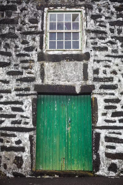 Doors: Portugal, Azores, Pico Island, Porto Cachorro. Old fishing community set in volcanic rock buildings by Walter Bibikow