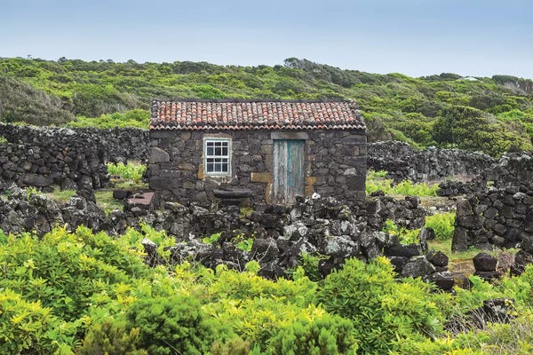 Portugal, Azores, Pico Island, Porto Cachorro. Old fishing community set in volcanic rock buildings