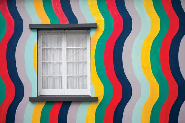 Windows: Portugal, Azores, Sao Miguel Island, Ponta Delgada. Colorful harborside building by Walter Bibikow