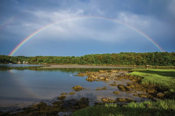 Rainbows: USA, Massachusetts, Cape Ann, Gloucester. Circular rainbow over Goose Cove by Walter Bibikow