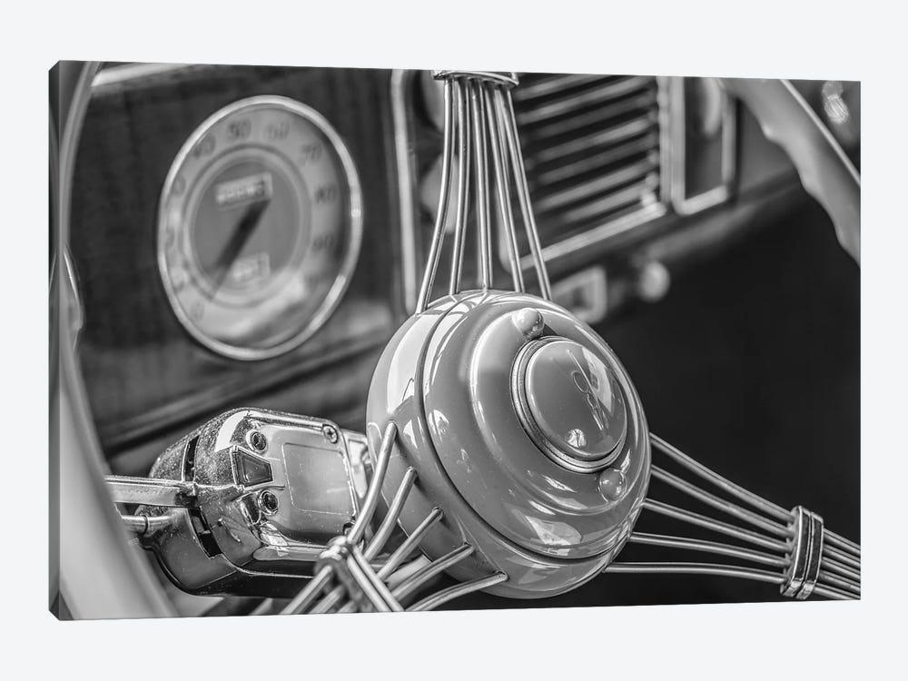 USA, Massachusetts, Essex. Interior detail of antique cars, 1940's-era steering wheel. by Walter Bibikow 1-piece Canvas Artwork