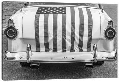 USA, Massachusetts, Essex. Antique cars, detail of 1950's-era Ford draped with US flag. Canvas Art Print - American Flag Art
