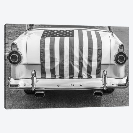 USA, Massachusetts, Essex. Antique cars, detail of 1950's-era Ford draped with US flag. Canvas Print #WBI220} by Walter Bibikow Canvas Artwork