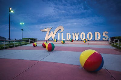 Black & Dark Art - Canvas Prints: USA, New Jersey, Wildwoods. Wildwoods Welcome Sign And Beach Balls by Walter Bibikow