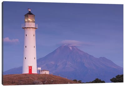 New Zealand, North Island, Pungarehu. Cape Egmont Lighthouse and Mt. Taranaki I Canvas Art Print - Lighthouse Art