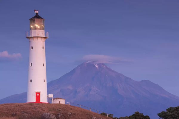 Walter Bibikow: New Zealand, North Island, Pungarehu. Cape Egmont Lighthouse and Mt. Taranaki I by Walter Bibikow