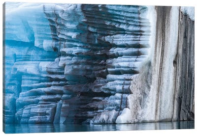 Norway, Svalbard, Spitsbergen. Large Piece Of Glacial Ice Flipped Over With Moraine Remnants. Canvas Art Print - Yuri Choufour
