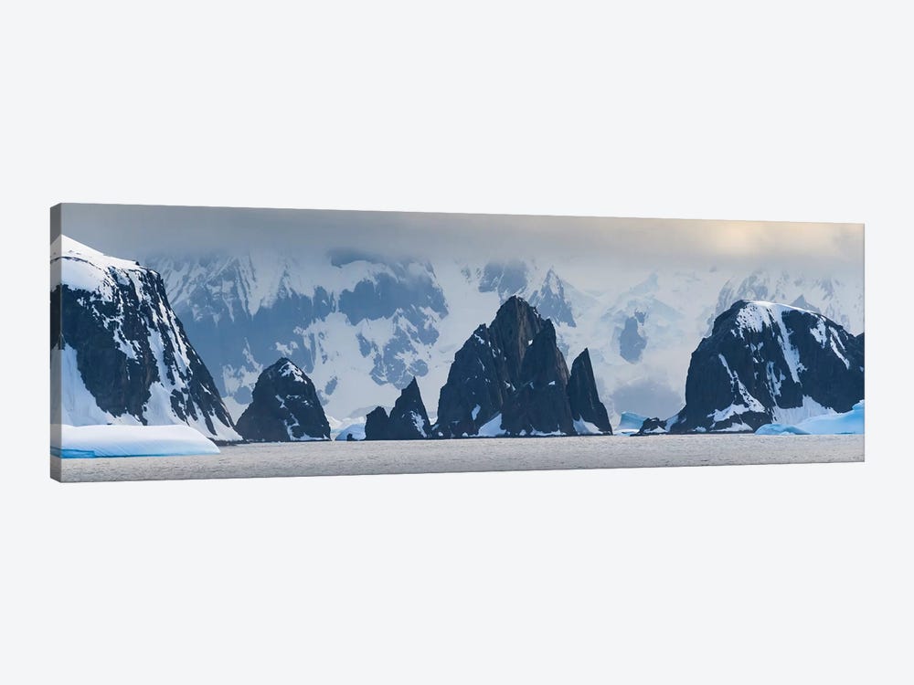 Antarctic Peninsula, Antarctica, Spert Island. Craggy Rocks And Mountains. by Yuri Choufour 1-piece Canvas Art Print