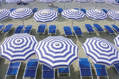 Blue Umbrellas...One Is Not Enough by Zoe Schumacher framed wall art