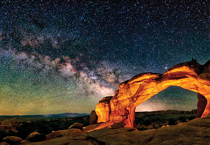 A Glowing Milky Way Rises Over Broken Arch In Arches National Park, Utah by OLena Art