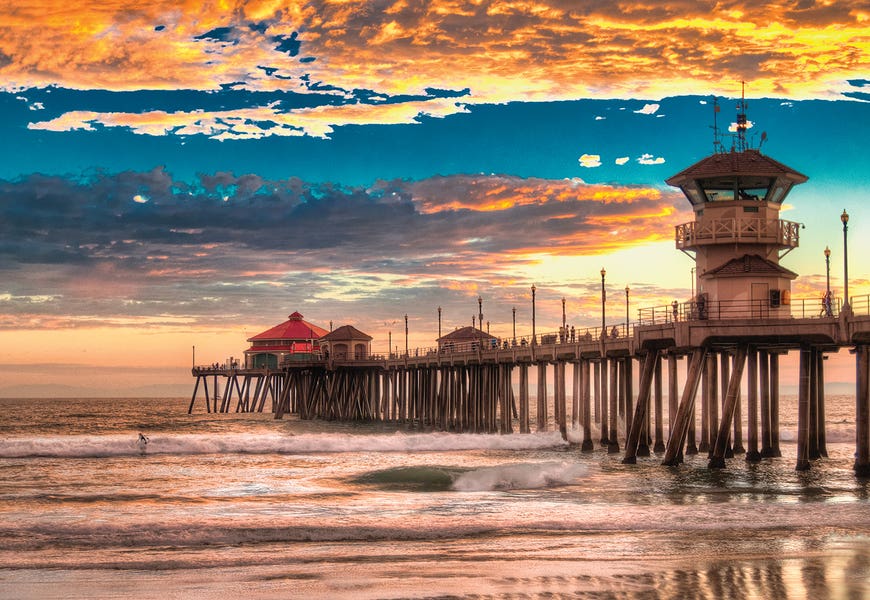 Huntington Beach Pier - Last Set. by Zoe Schumacher