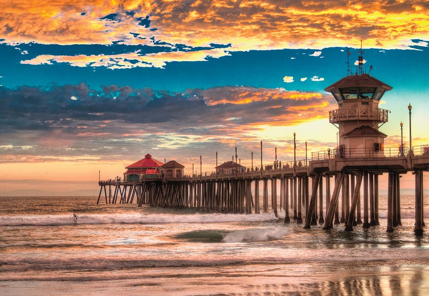 Huntington Beach Pier - Last Set. by Zoe Schumacher