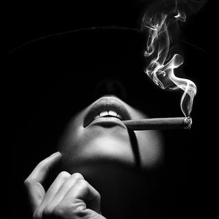 Woman Smoking A Cigar by Johan Swanepoel