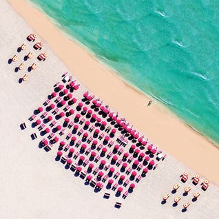 South Beach With Chairs And Umbrella by Susanne Kremer