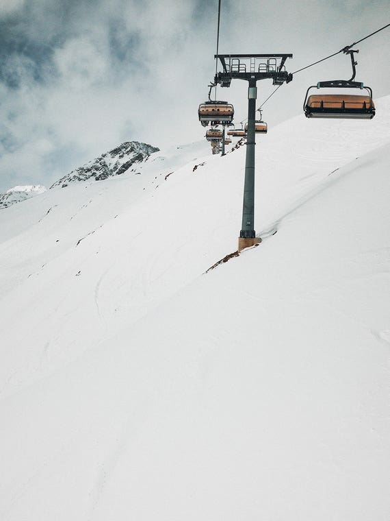Riding The Lift In Winter by Sebastian Hilgetag