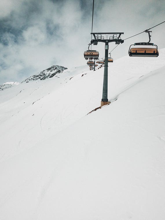 Riding The Lift In Winter by Sebastian Hilgetag